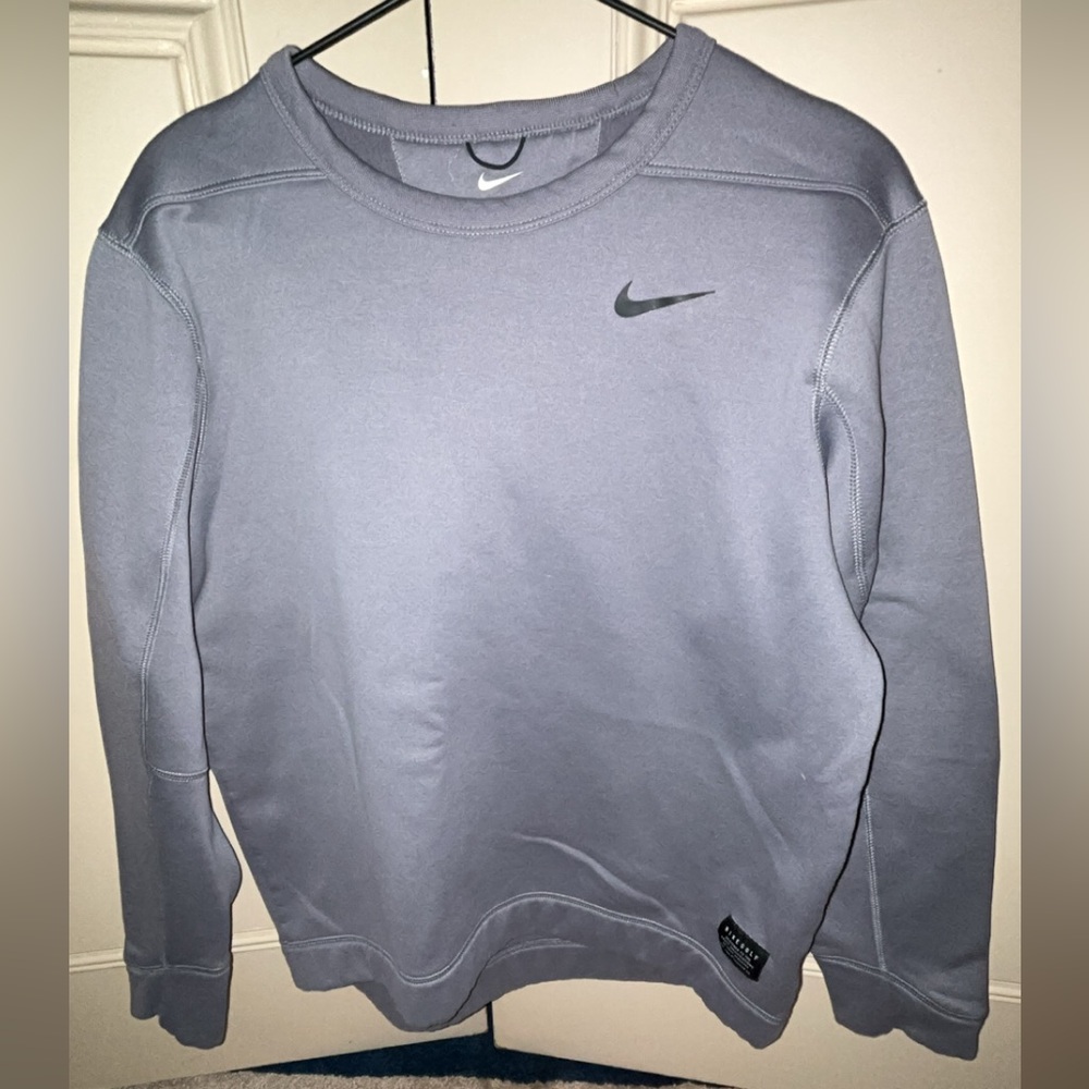 Medium Nike golf grey warm crewneck.